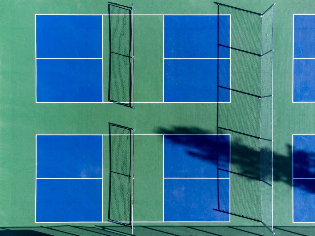 Overhead view of premium blue and green pickleball courts